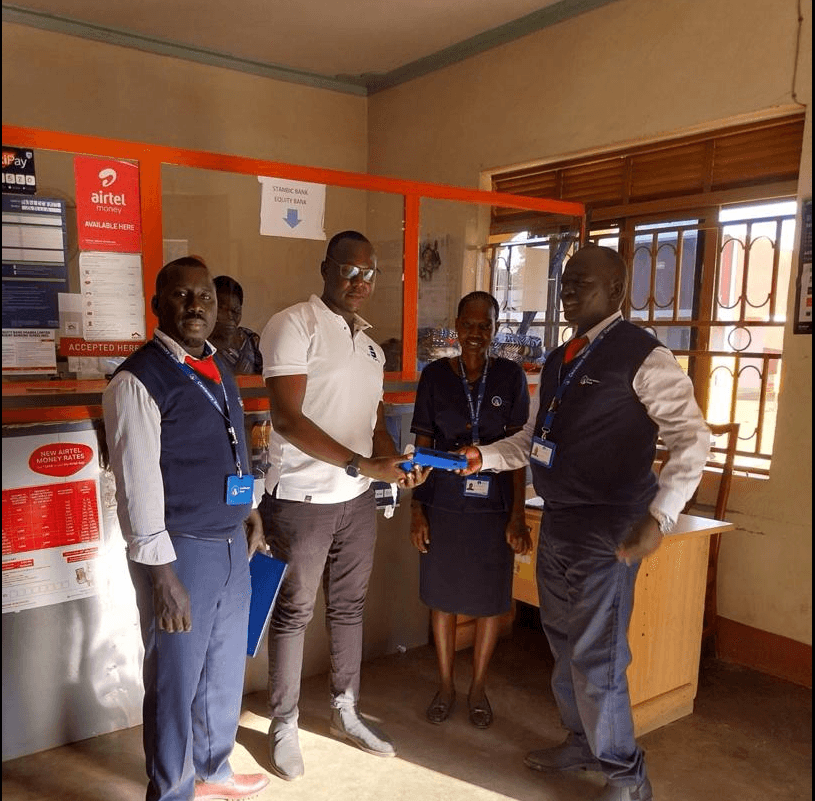 Banking agent assisting a customer at a counter